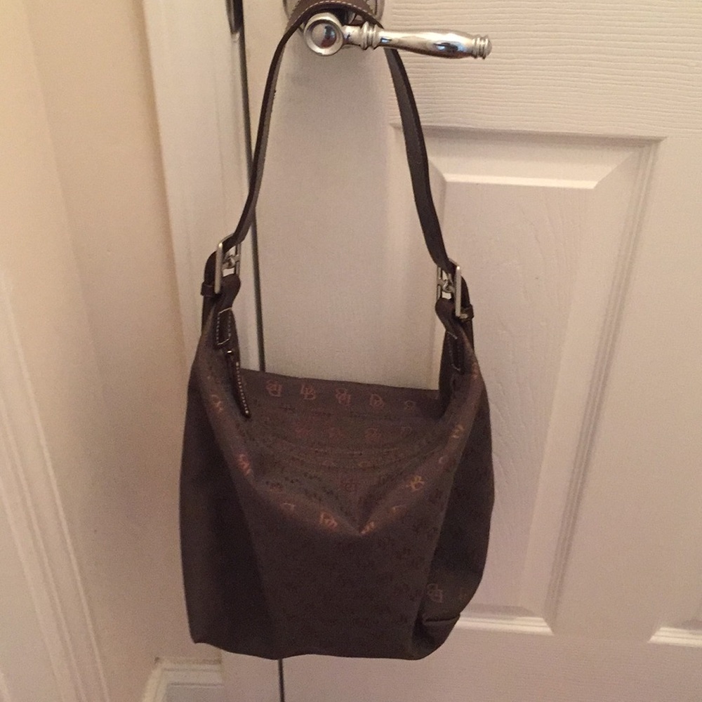 Like new Dooney and Bourke green and gold hobo bag